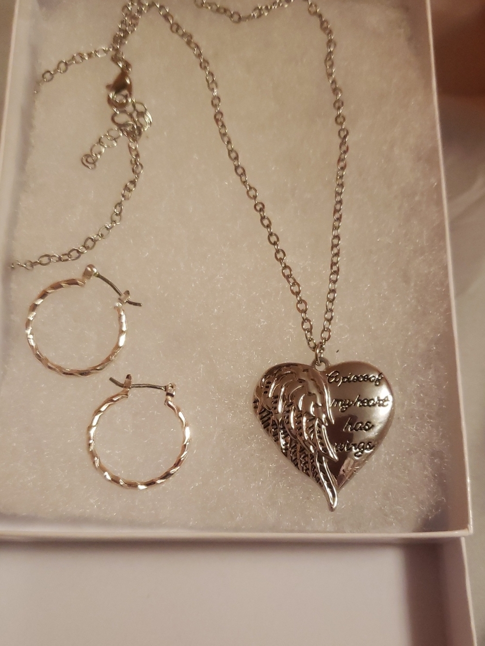 A piece of my heart necklace and earrings.